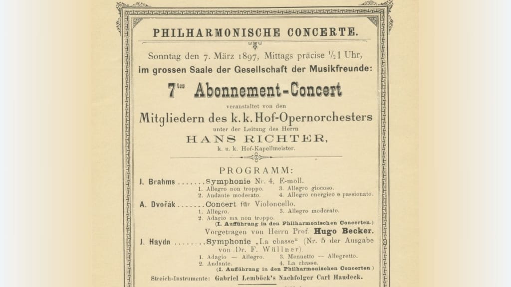 A photo of a the programme from a concert in Vienna on 8 March 1897. Printed on a dark cream coloured paper with a decorative border, it list the music to be performed by Brahms, Dvořák and Haydn.